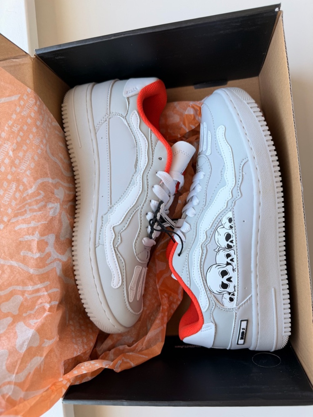 Brand X White Skate-Style Sneakers with Orange Lining and Skull Graphic